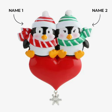 Couples Penguins Sitting on Heart Ornament